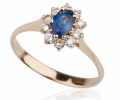 Gold vintage ring with sapphire trimmed in diamonds side view Gold vintage ring with sapphire trimmed in diamonds side view