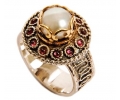 A Pearl Vintage Style Gold and Silver Ring with 12 Garnets side view A Pearl Vintage Style Gold and Silver Ring with 12 Garnets side view
