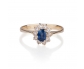 Gold vintage ring with sapphire trimmed in diamonds front view